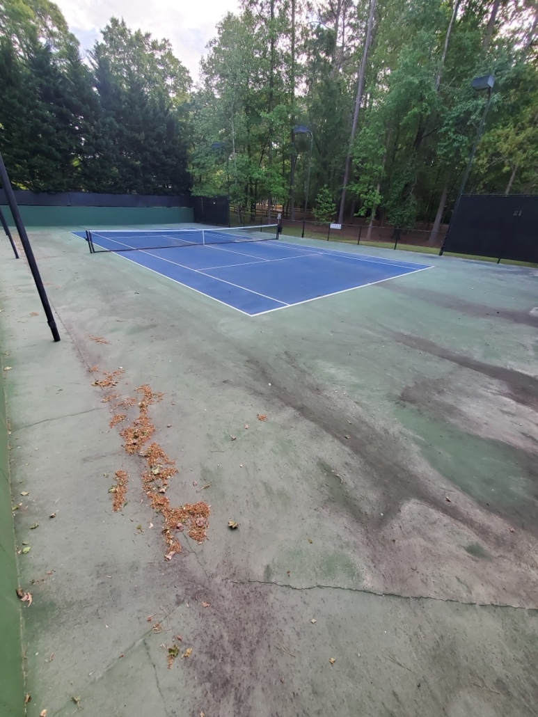 tennis court cleaning before